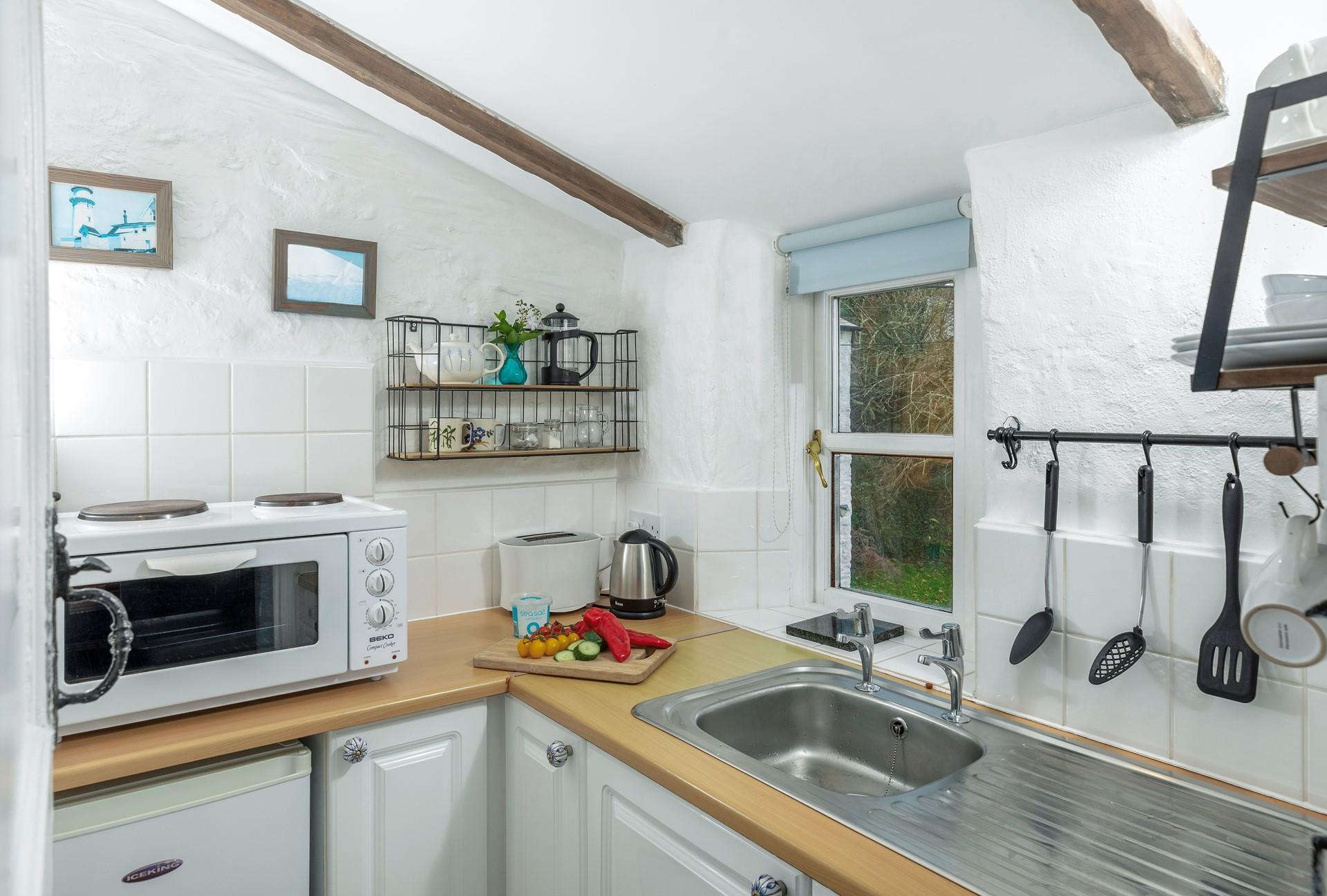 The kitchen is compact but equipped with all you need.