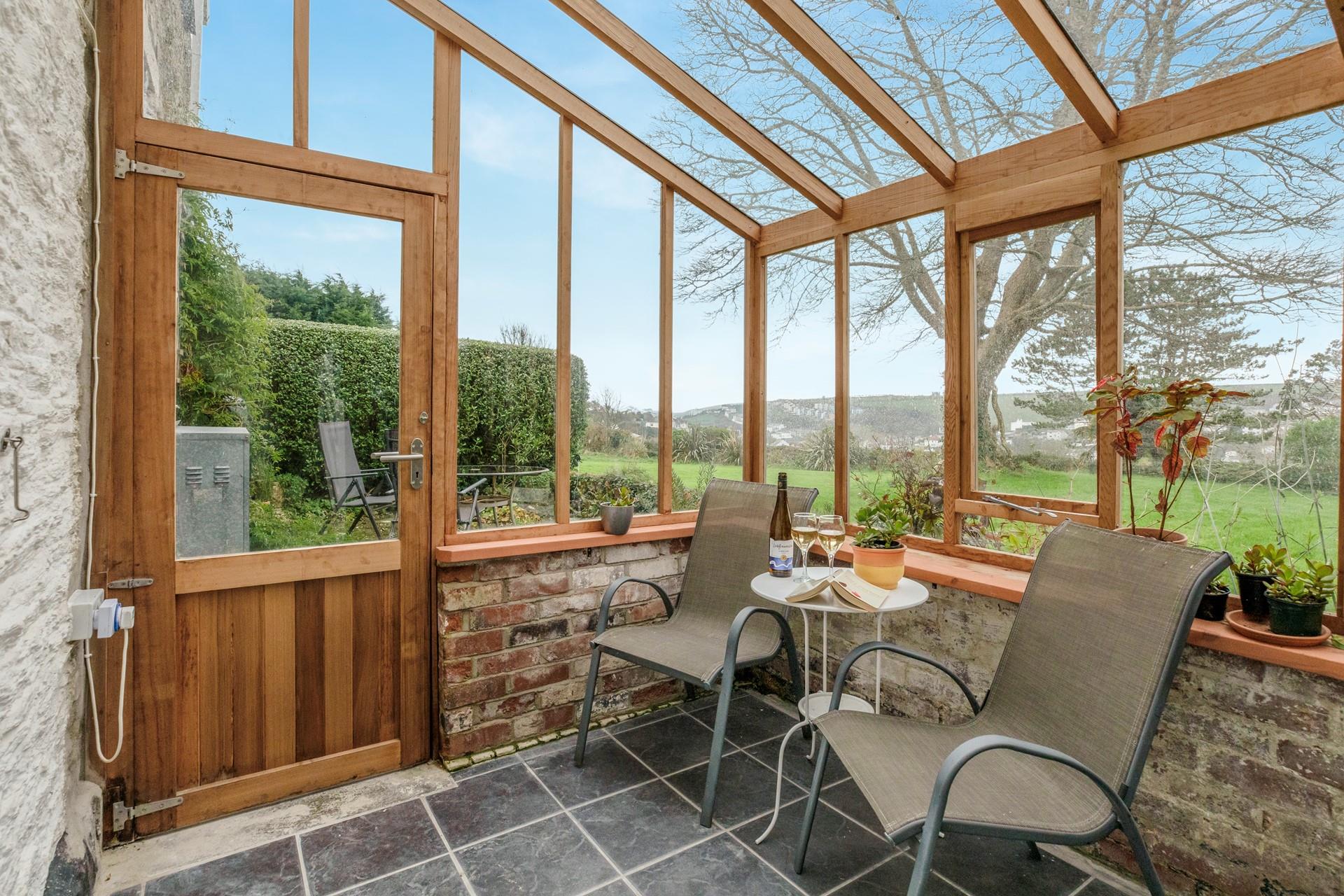 Spend afternoons relaxing in the sunny conservatory.