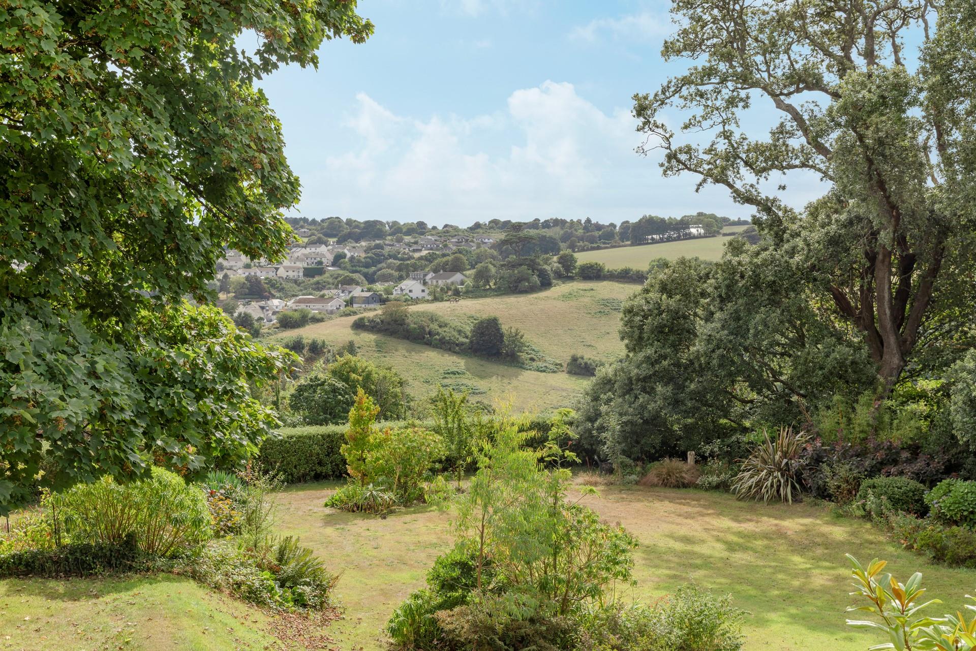 Soak up the sun in the leafy garden.