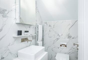 The ensuite is stylish and modern.