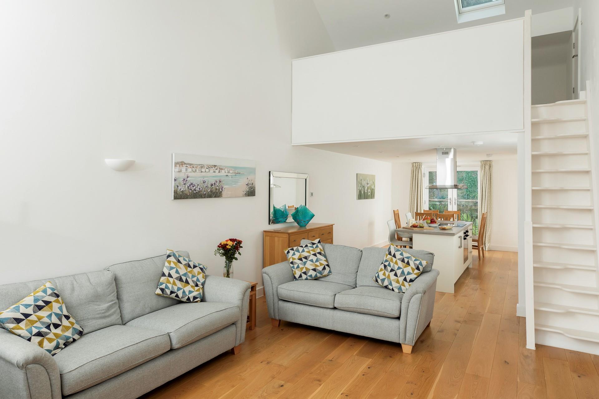 The open plan living space is ideal for spending quality time together.
