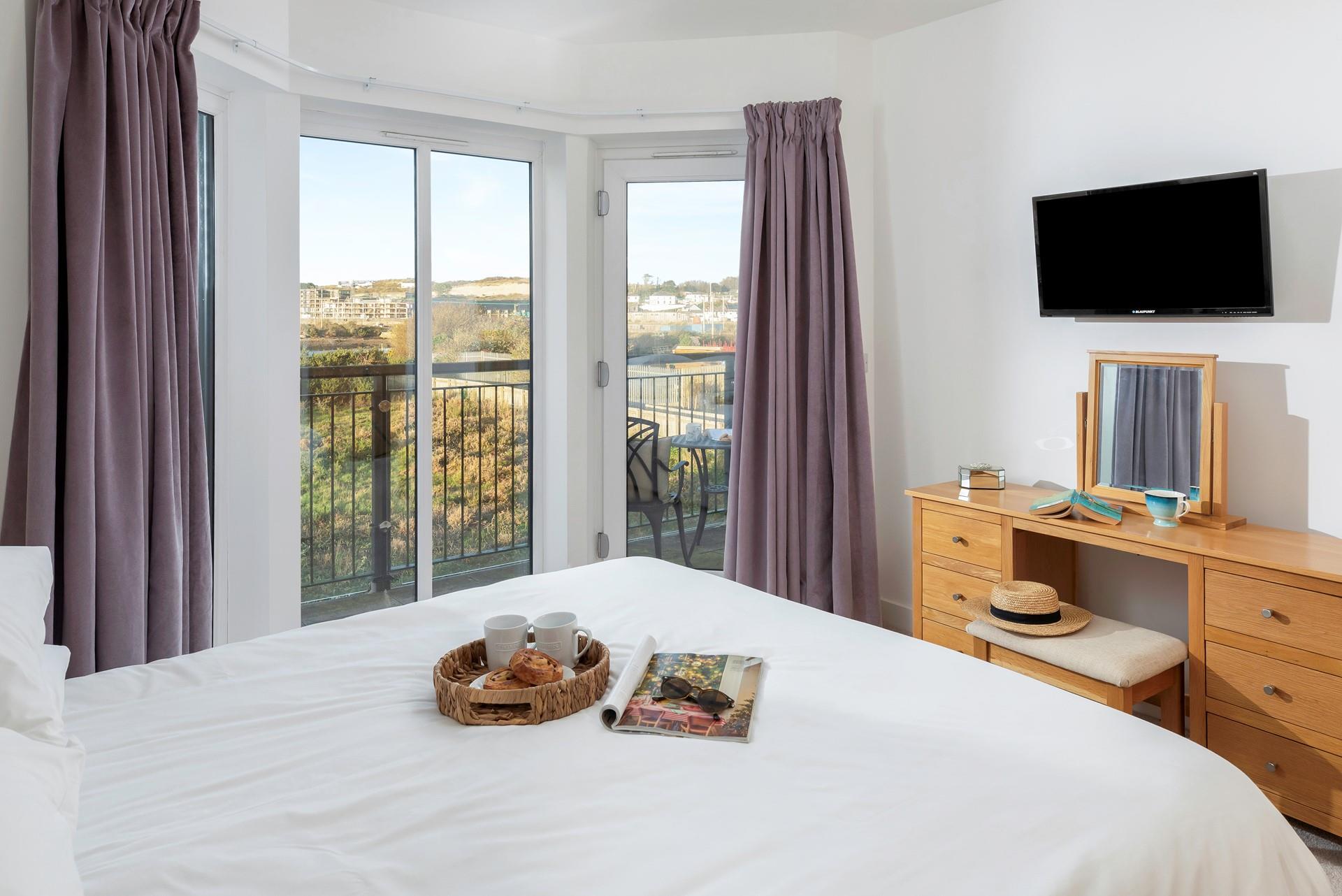 Enjoy the views from the spacious bedroom.