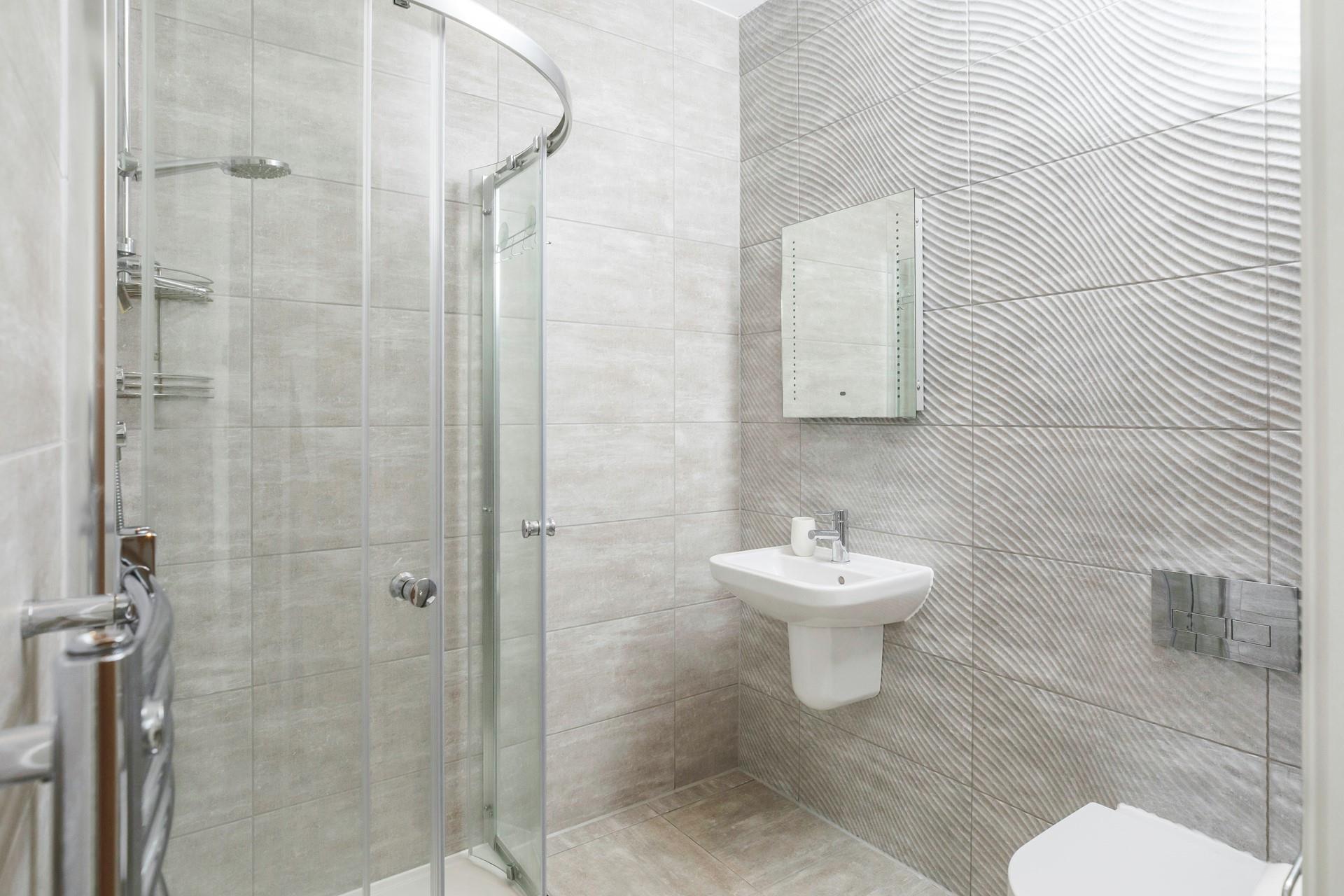 Wash off sandy toes in the shower room.