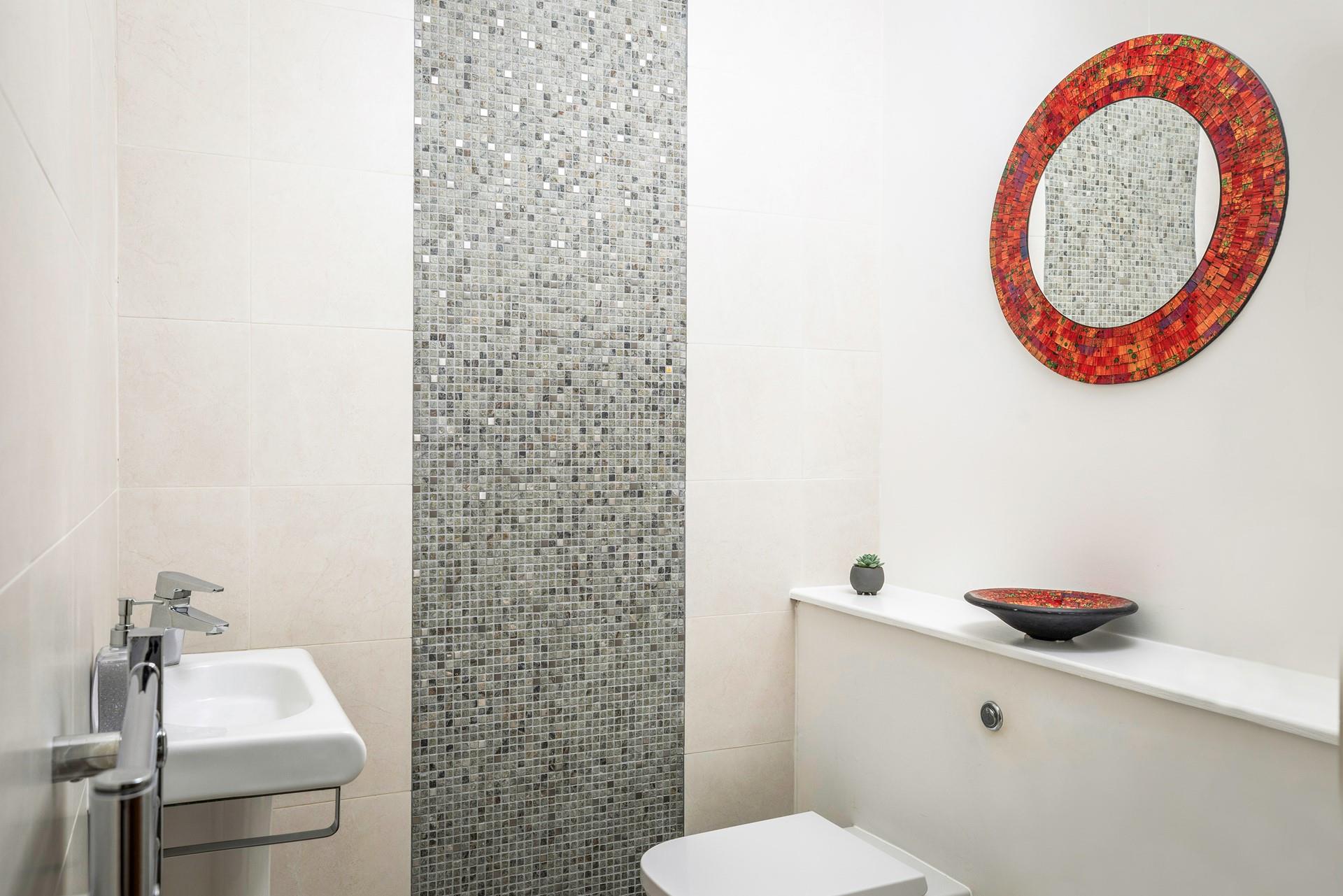 There is an additional WC and basin.