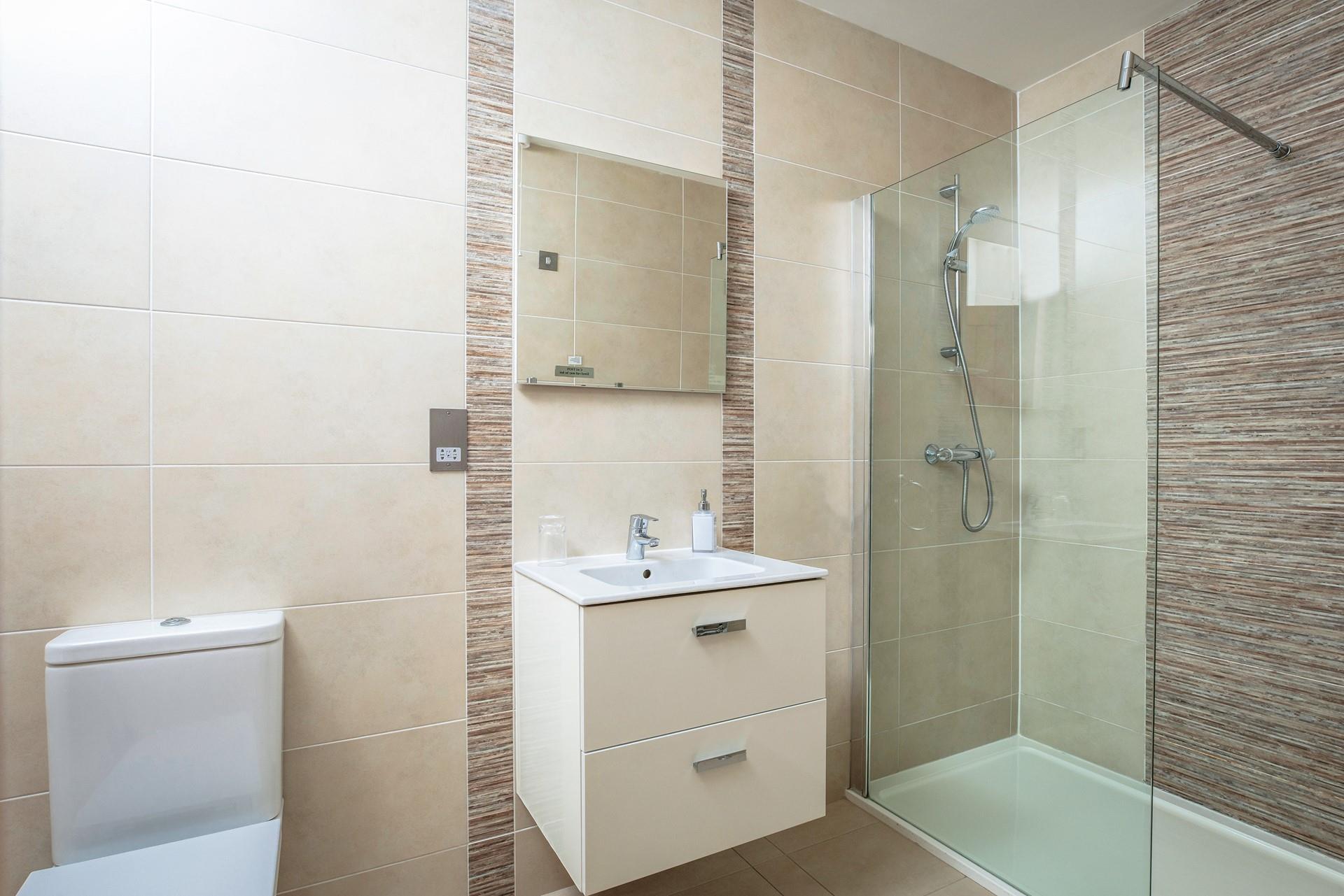 Each of the bedrooms has an en suite.