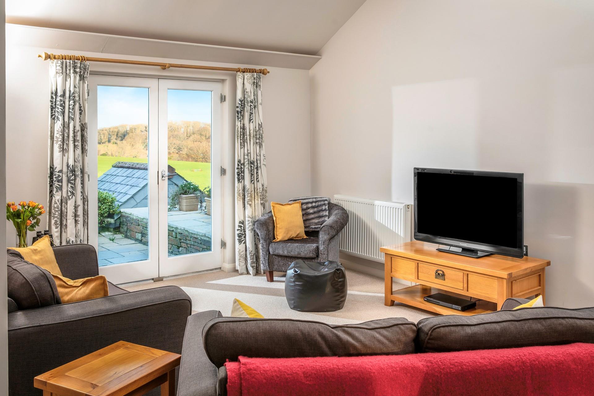 Enjoy countryside views from the sitting room.