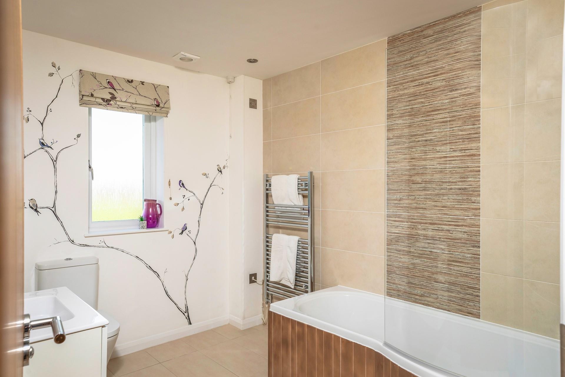 The bathroom is ideal for a relaxing soak in the tub.