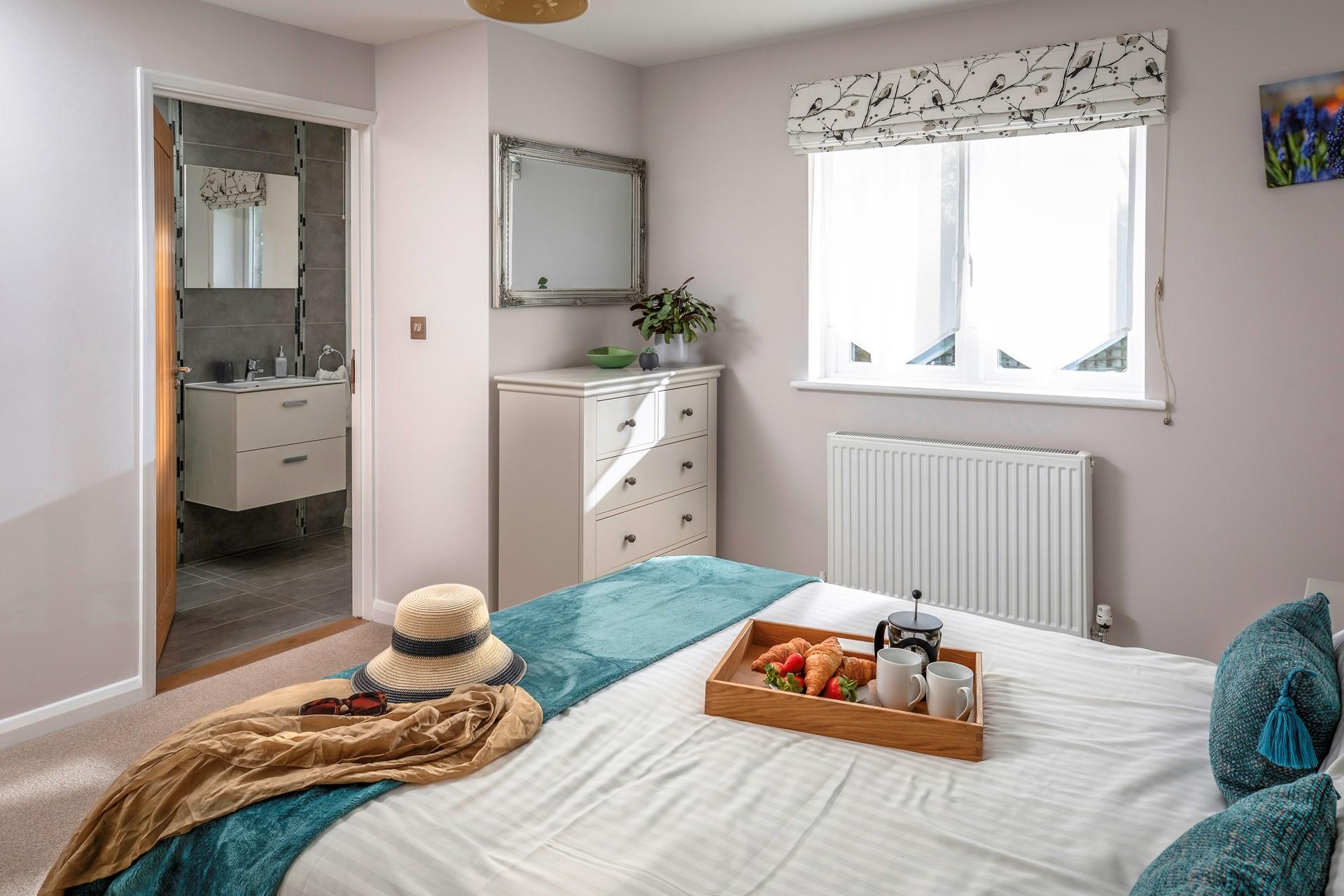 Bedroom 1 has a handy en suite shower room.