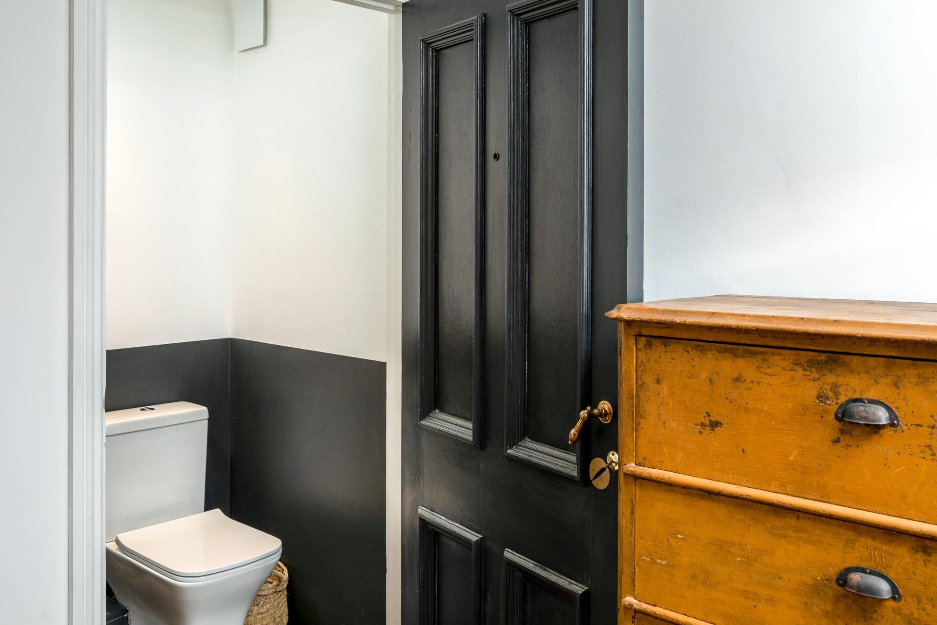 The downstairs cloakroom has an additional WC.