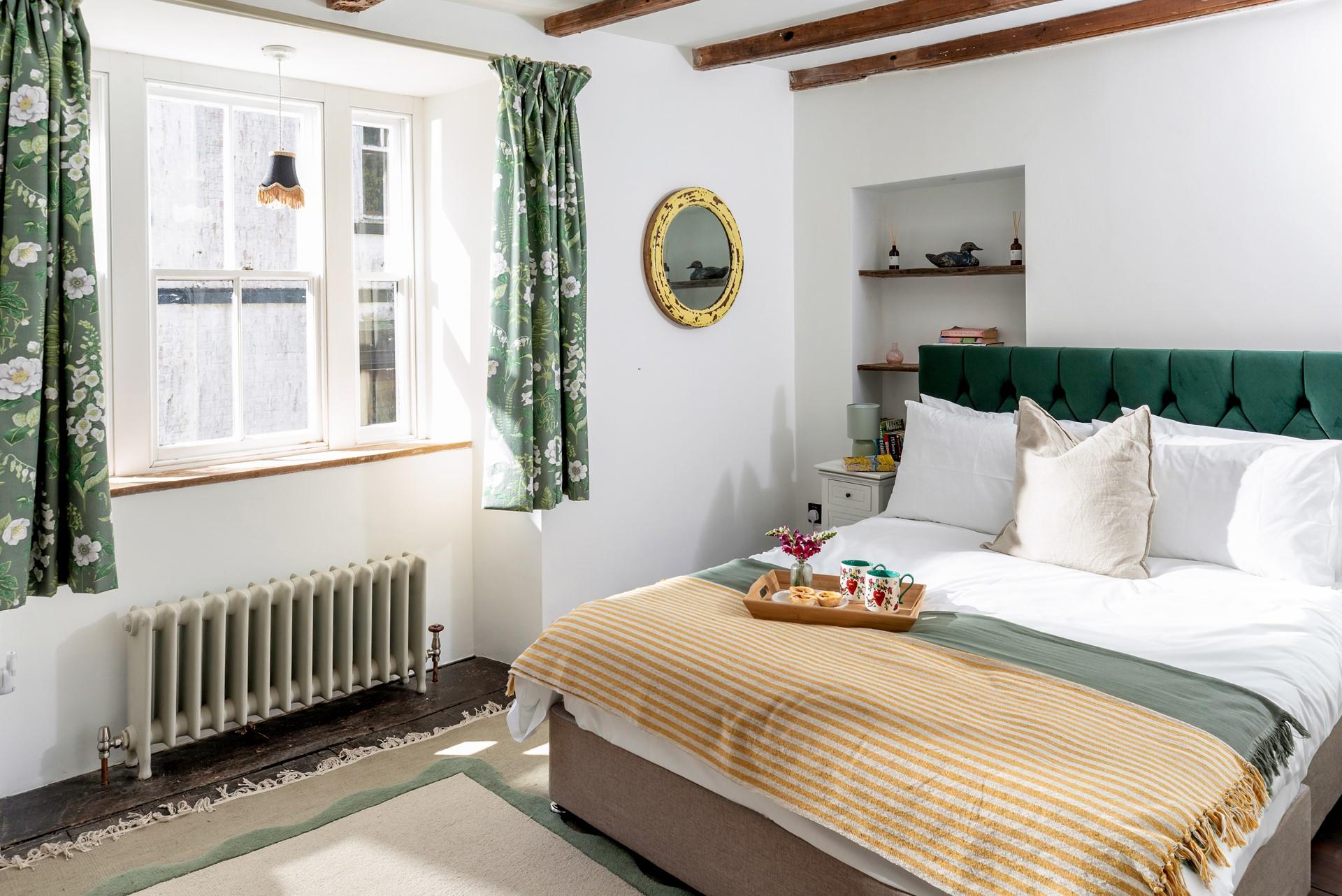 Bedroom 1 has a king size bed, a cosy base to rest your head each night.