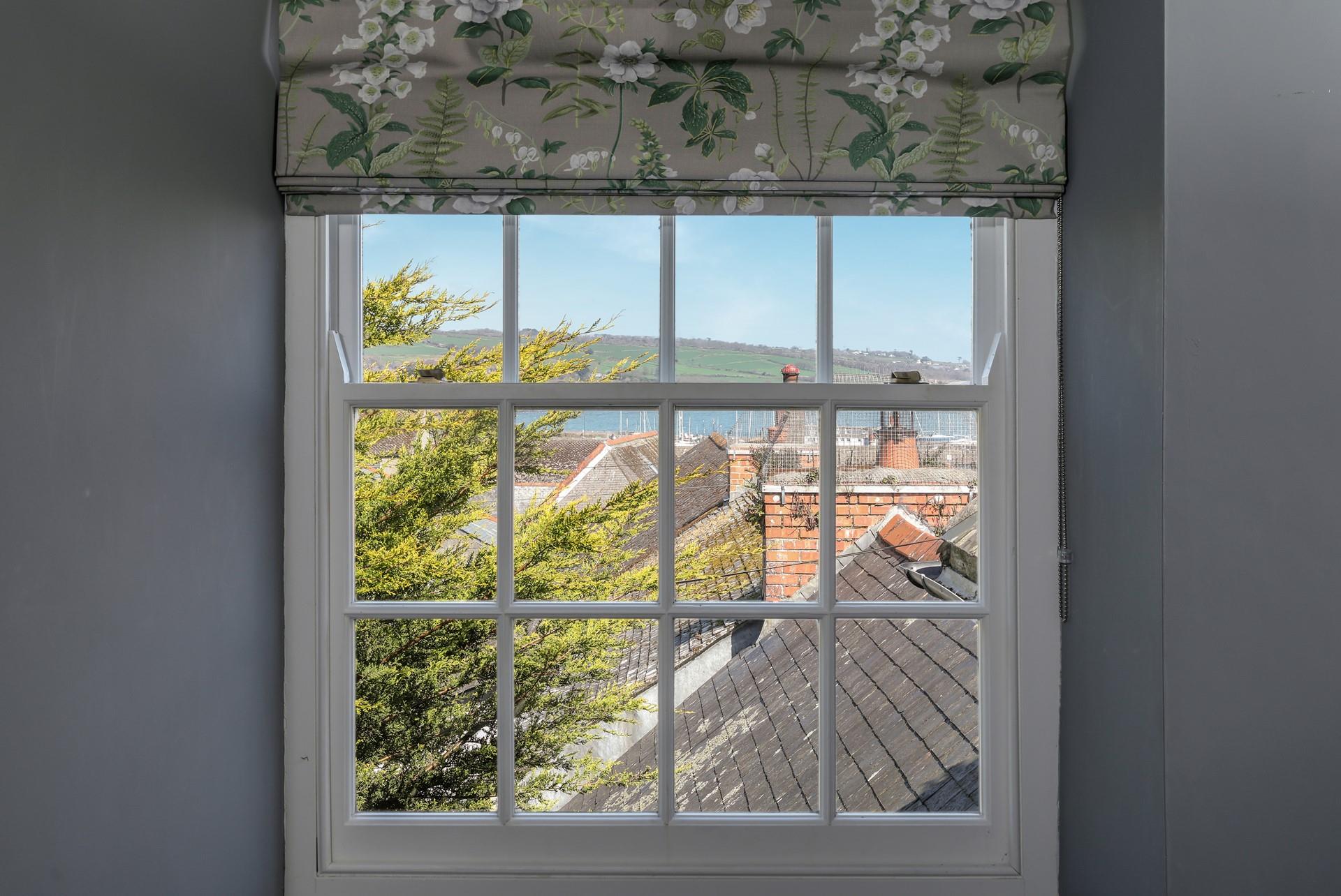 Bedroom 2 has sea views over the rooftops.