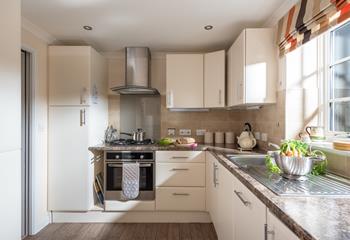 The kitchen is well-equipped for cooking tasty meals and hearty breakfasts.