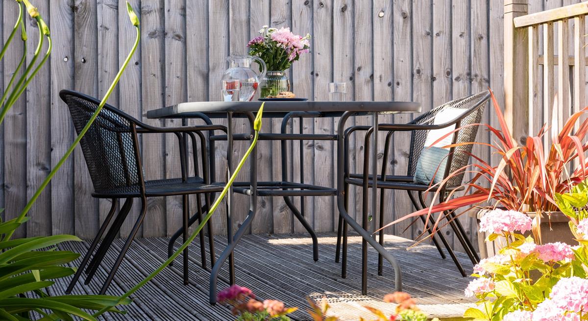 Tuck into a breakfast of fresh pastries on the suntrap decking.