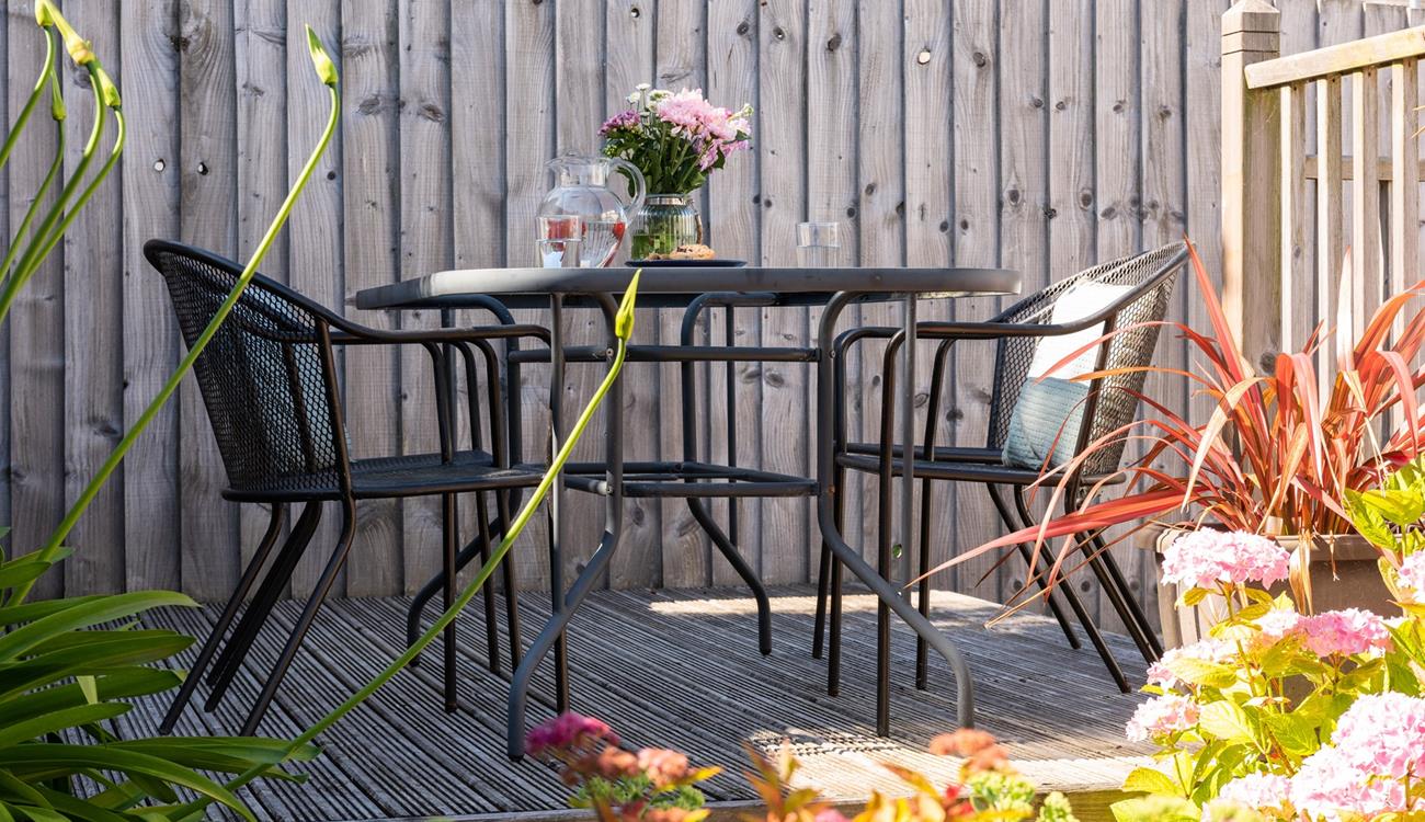 Tuck into a breakfast of fresh pastries on the suntrap decking.