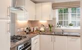 The kitchen is well-equipped for cooking tasty meals and hearty breakfasts. - Thumbnail Image