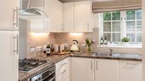 The kitchen is well-equipped for cooking tasty meals and hearty breakfasts.