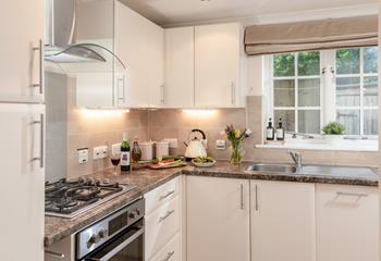 The kitchen is well-equipped for cooking tasty meals and hearty breakfasts.