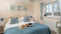 Bedroom 3 has zip and link beds for flexible sleeping arrangements.