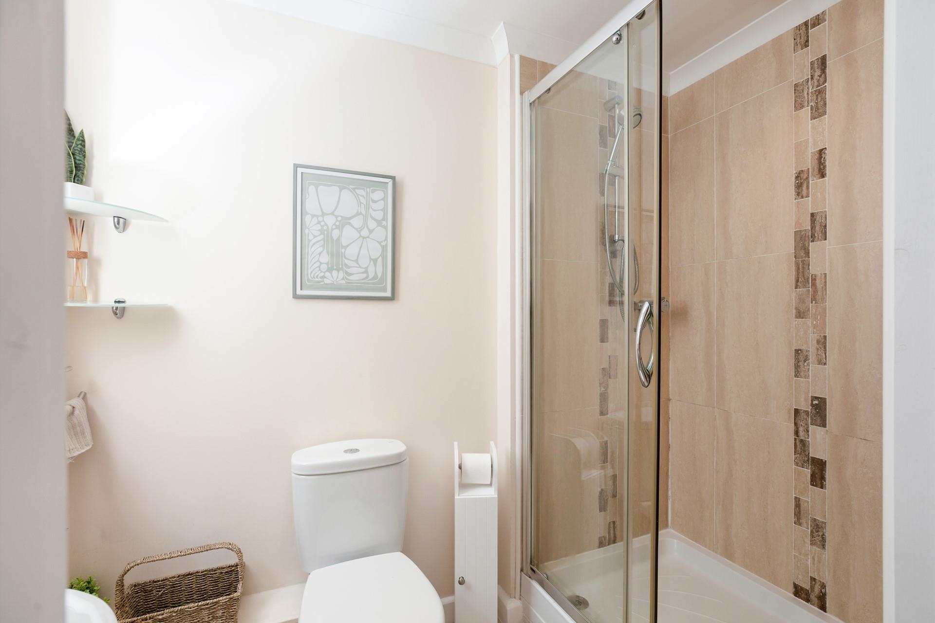 Wash off sandy toes in the shower after a day on the golden sands of Porthmeor beach.