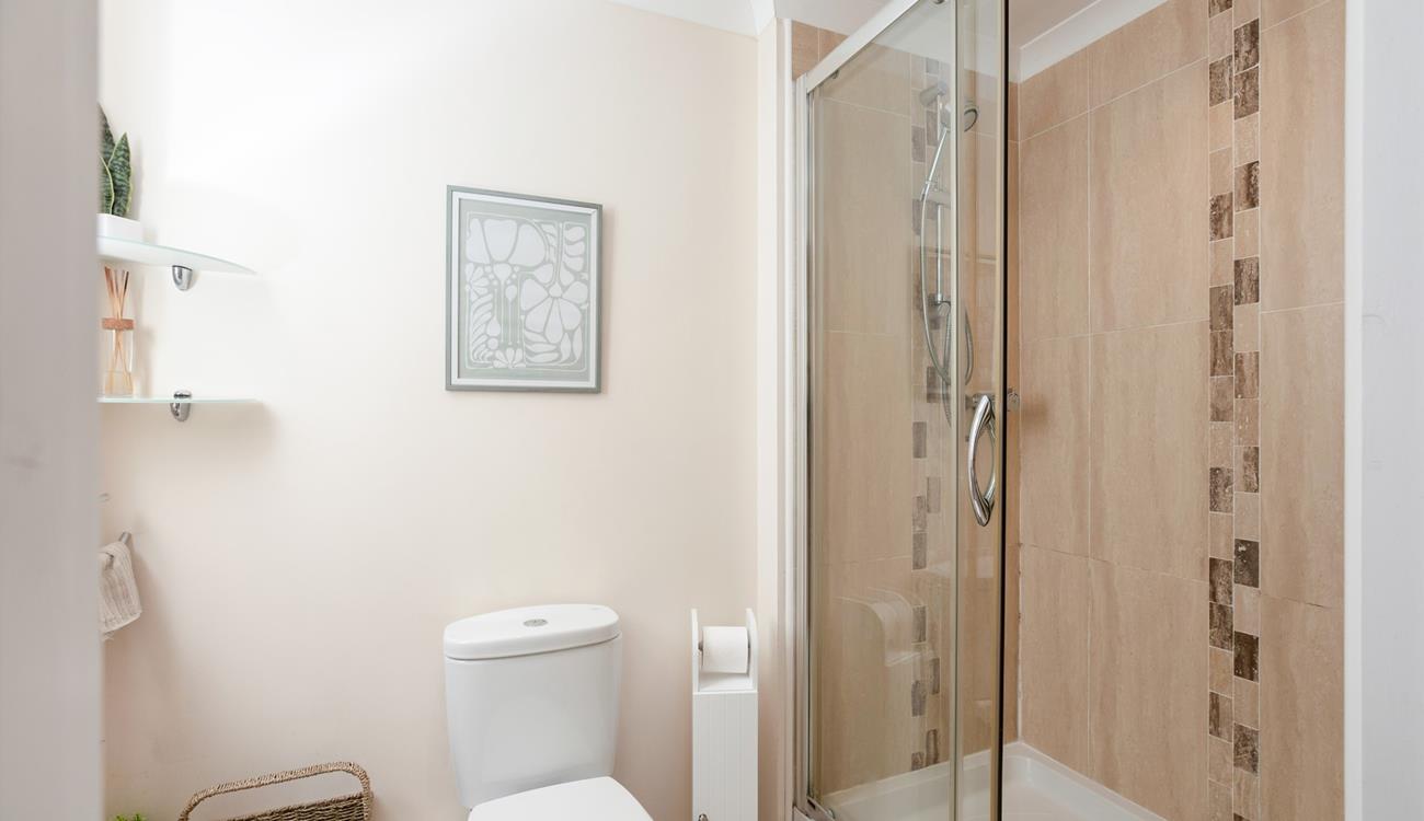 Wash off sandy toes in the shower after a day on the golden sands of Porthmeor beach.