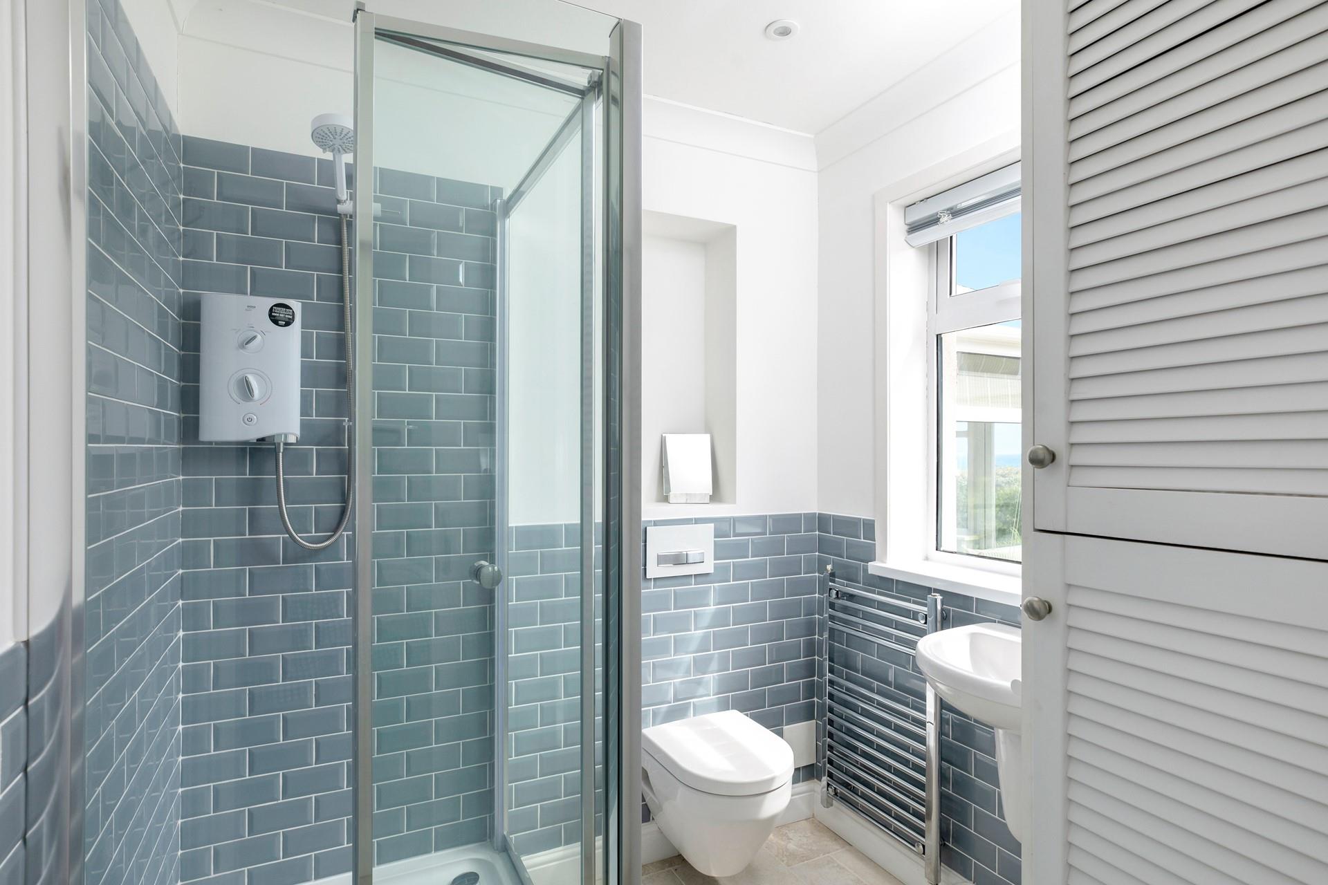 Wash the day away in the en suite shower room.