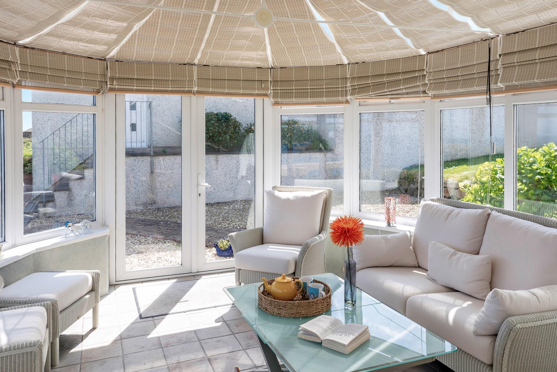 Get stuck into a good book with a cuppa in the conservatory.