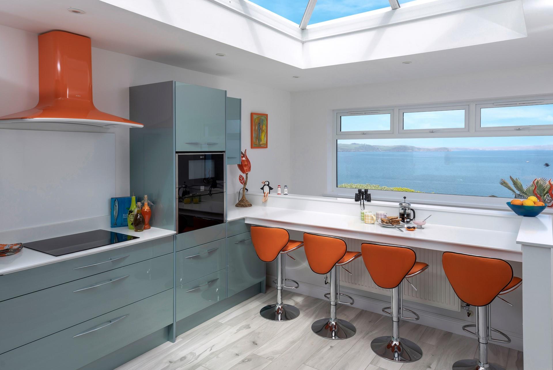The kitchen is modern and sleek, ideal for cooking culinary delights.