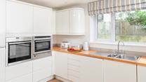 Cook up a storm in the well-equipped kitchen.