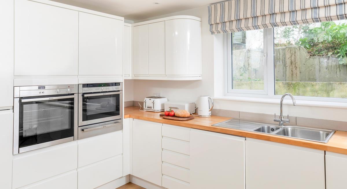 Cook up a storm in the well-equipped kitchen.