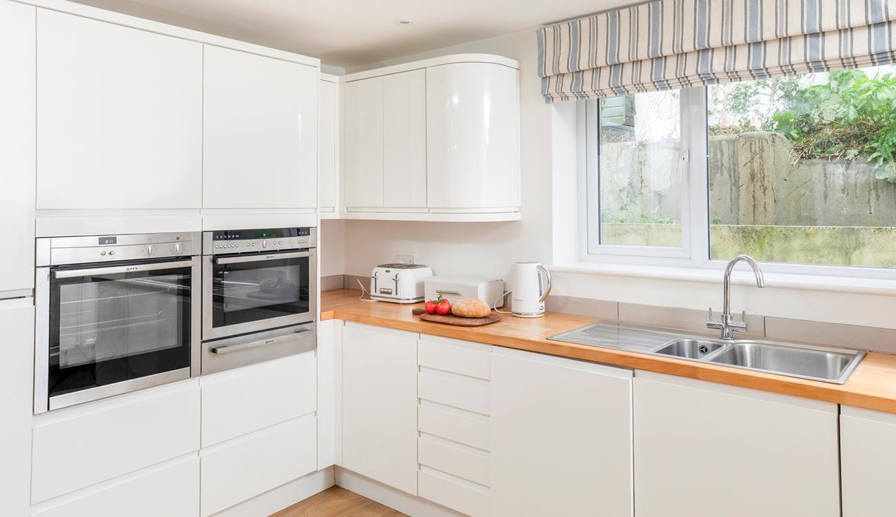 Cook up a storm in the well-equipped kitchen.