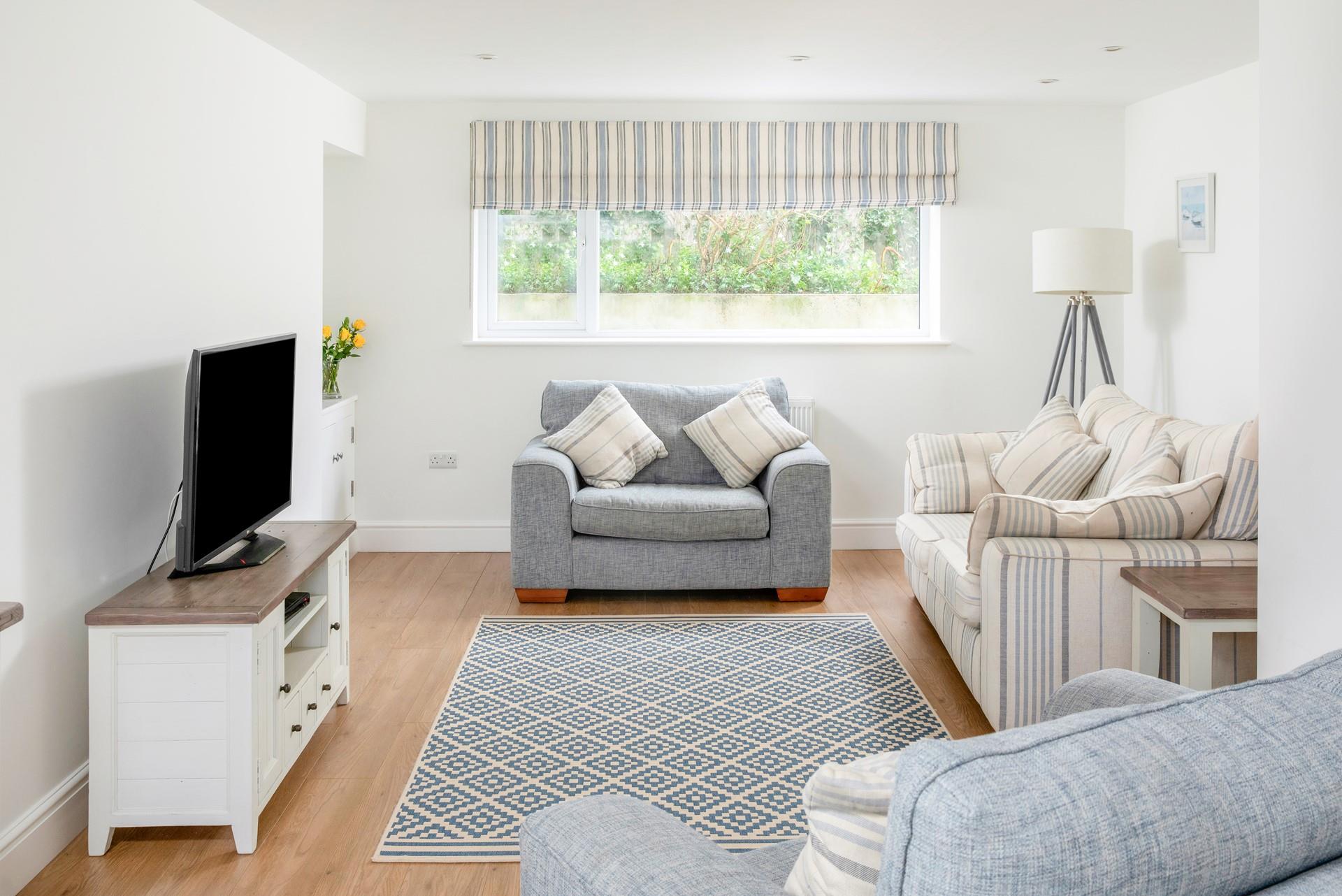 Sit back and relax in the cosy sitting room.