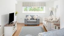 Sit back and relax in the cosy sitting room.