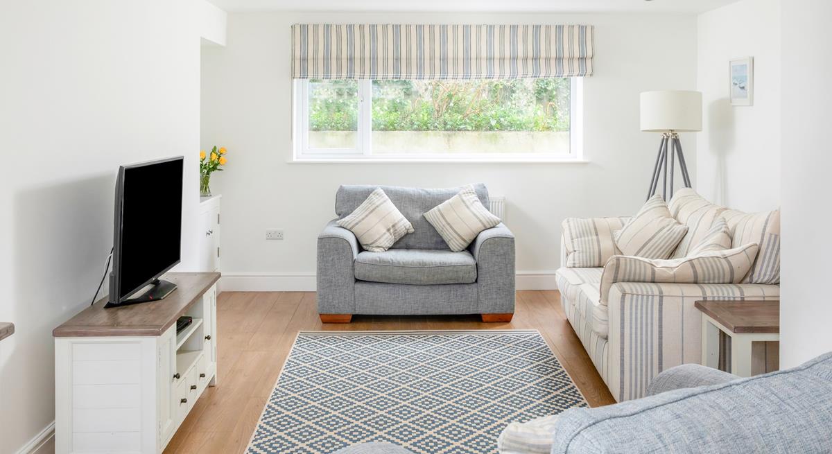 Sit back and relax in the cosy sitting room.