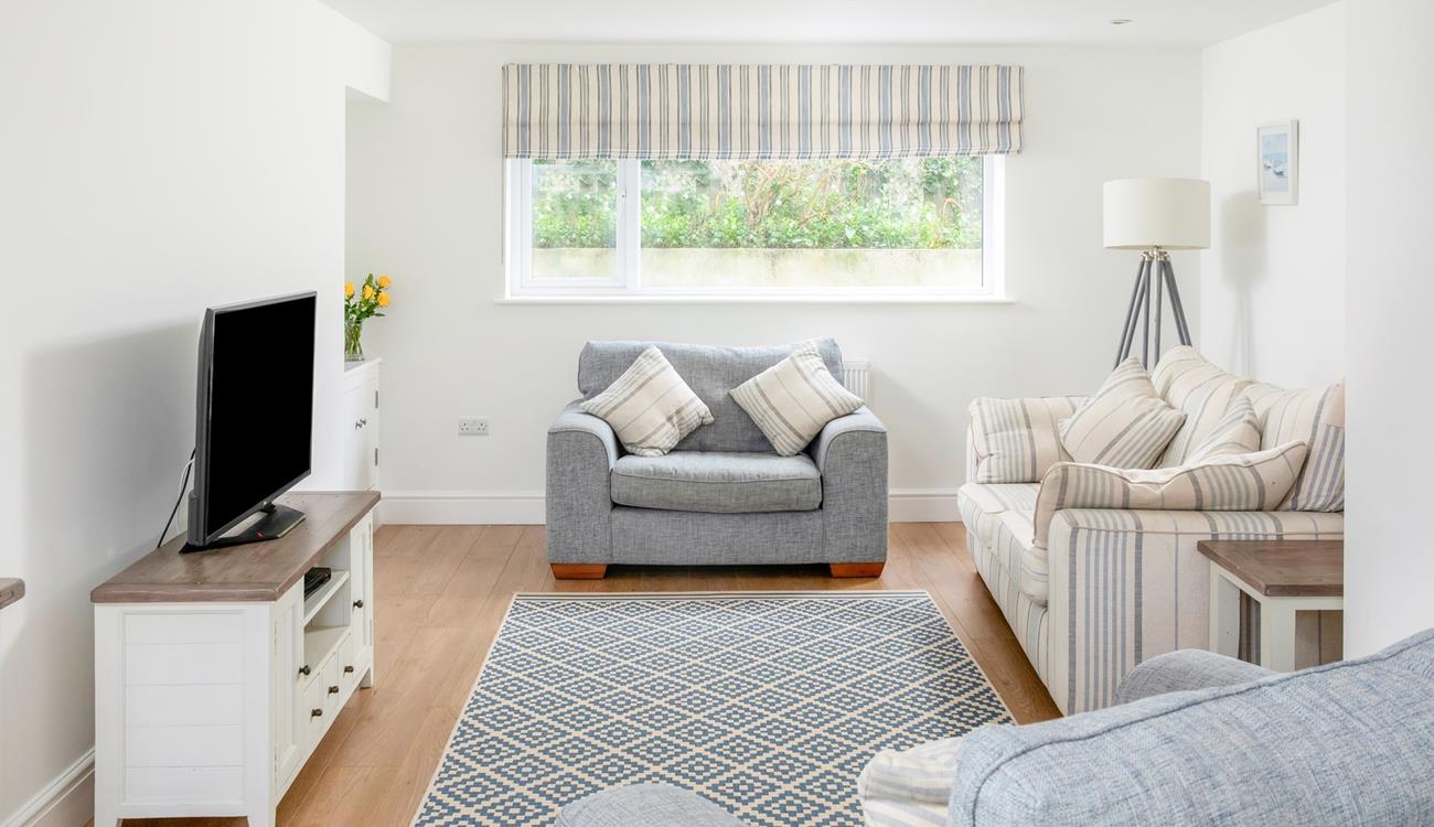 Sit back and relax in the cosy sitting room.