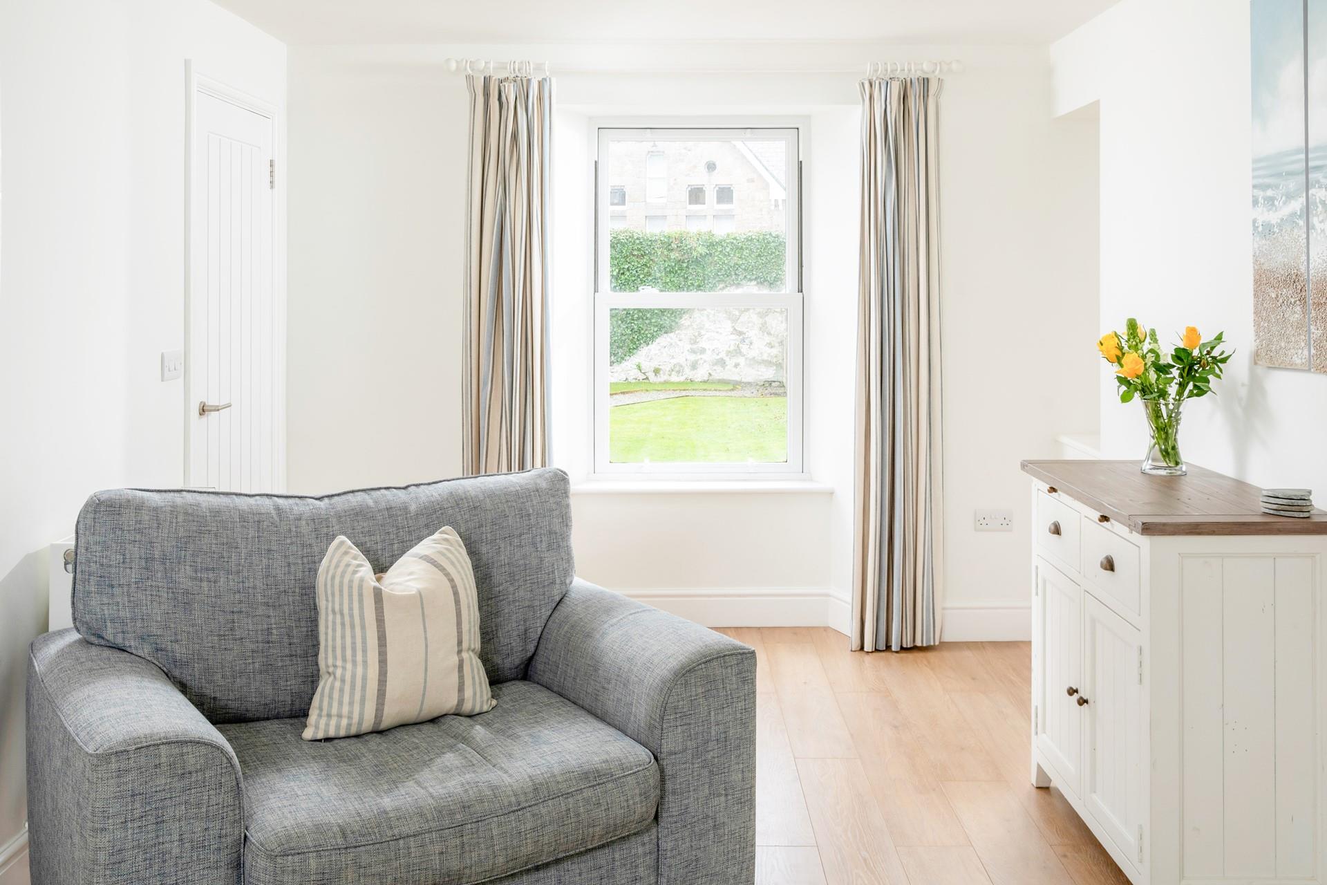 Calming neutral tones await in Rosevale Cottage.