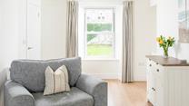 Calming neutral tones await in Rosevale Cottage.