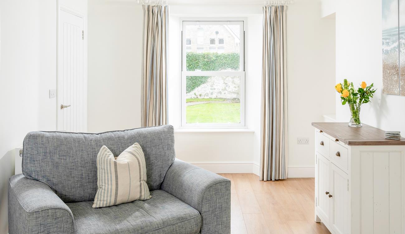 Calming neutral tones await in Rosevale Cottage.