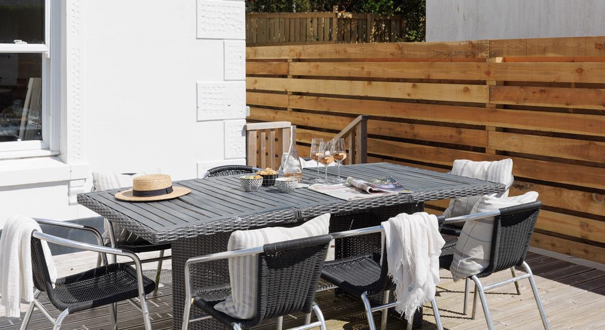 Sip a glass of wine as the sun comes down.