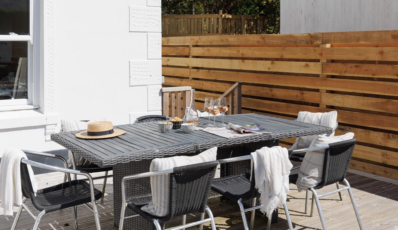 Sip a glass of wine as the sun comes down.