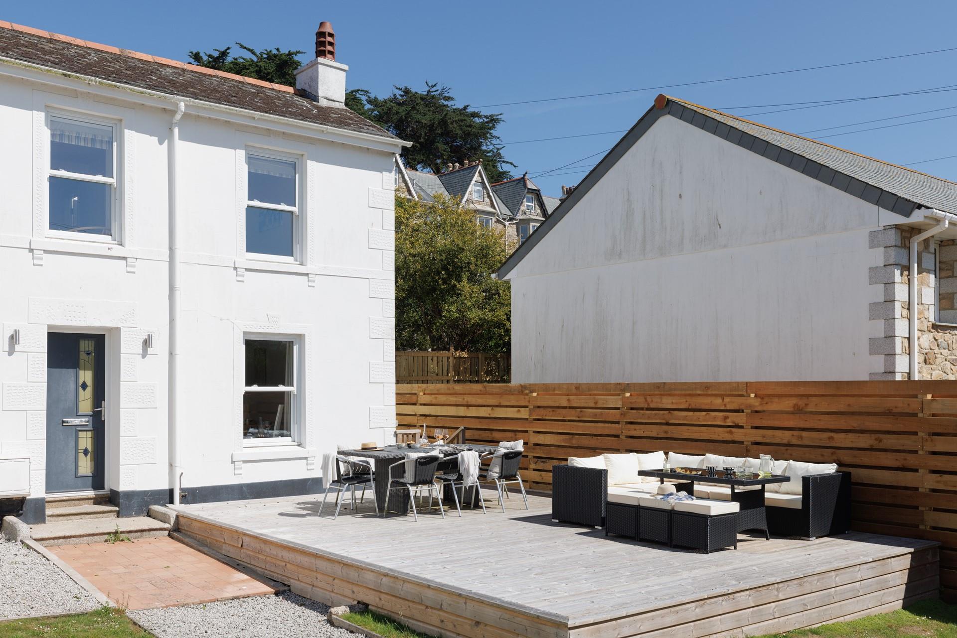 The decking area is perfect to relax and unwind.