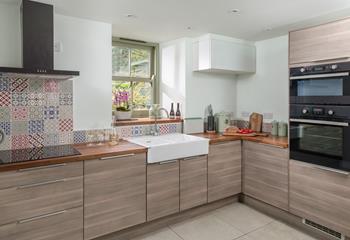 The stylish kitchen is a dream to cook in.