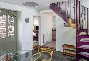 Step from the dining room into the lounge and kitchen.
