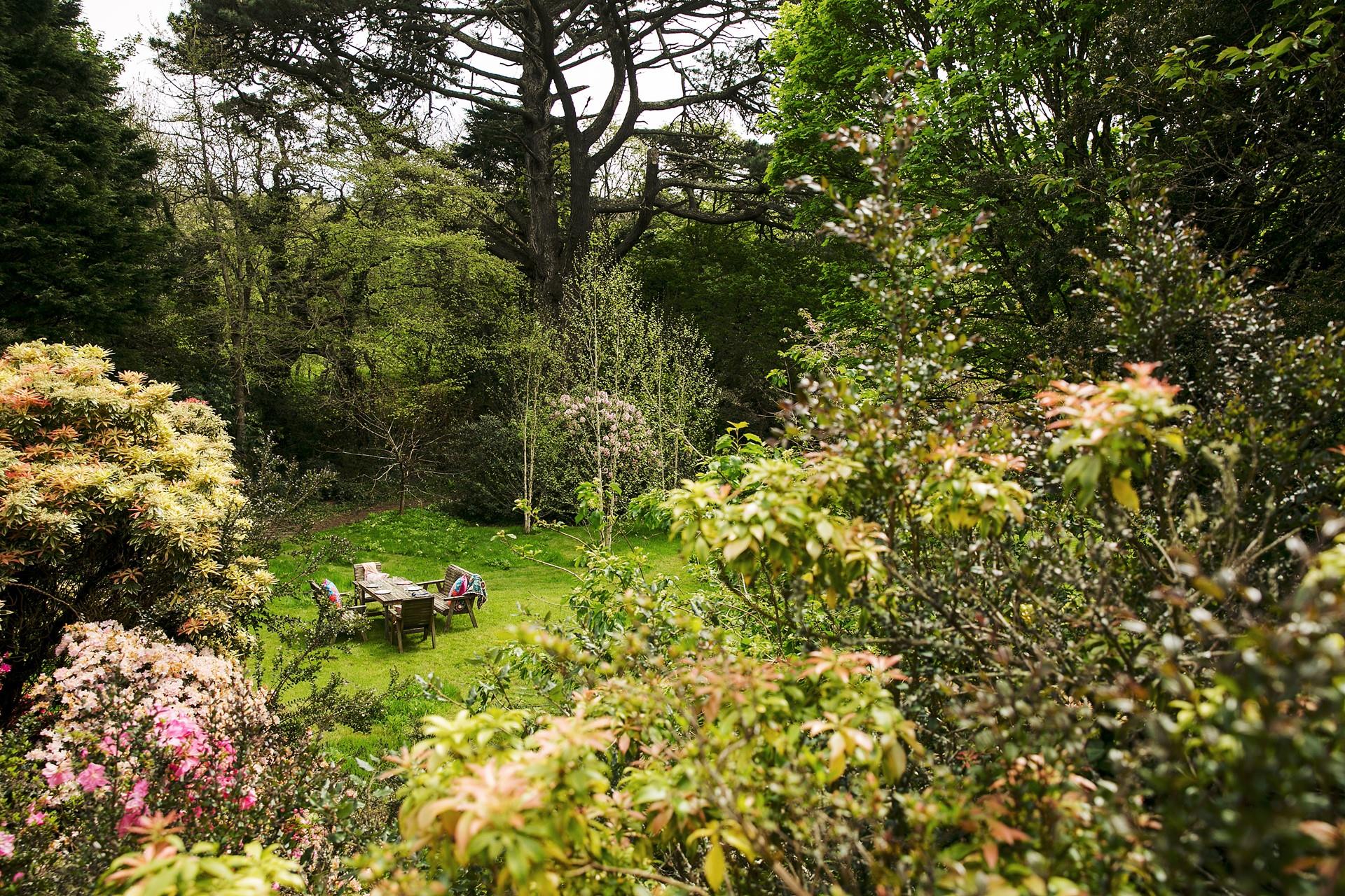 The large garden is ideal for al fresco dining.