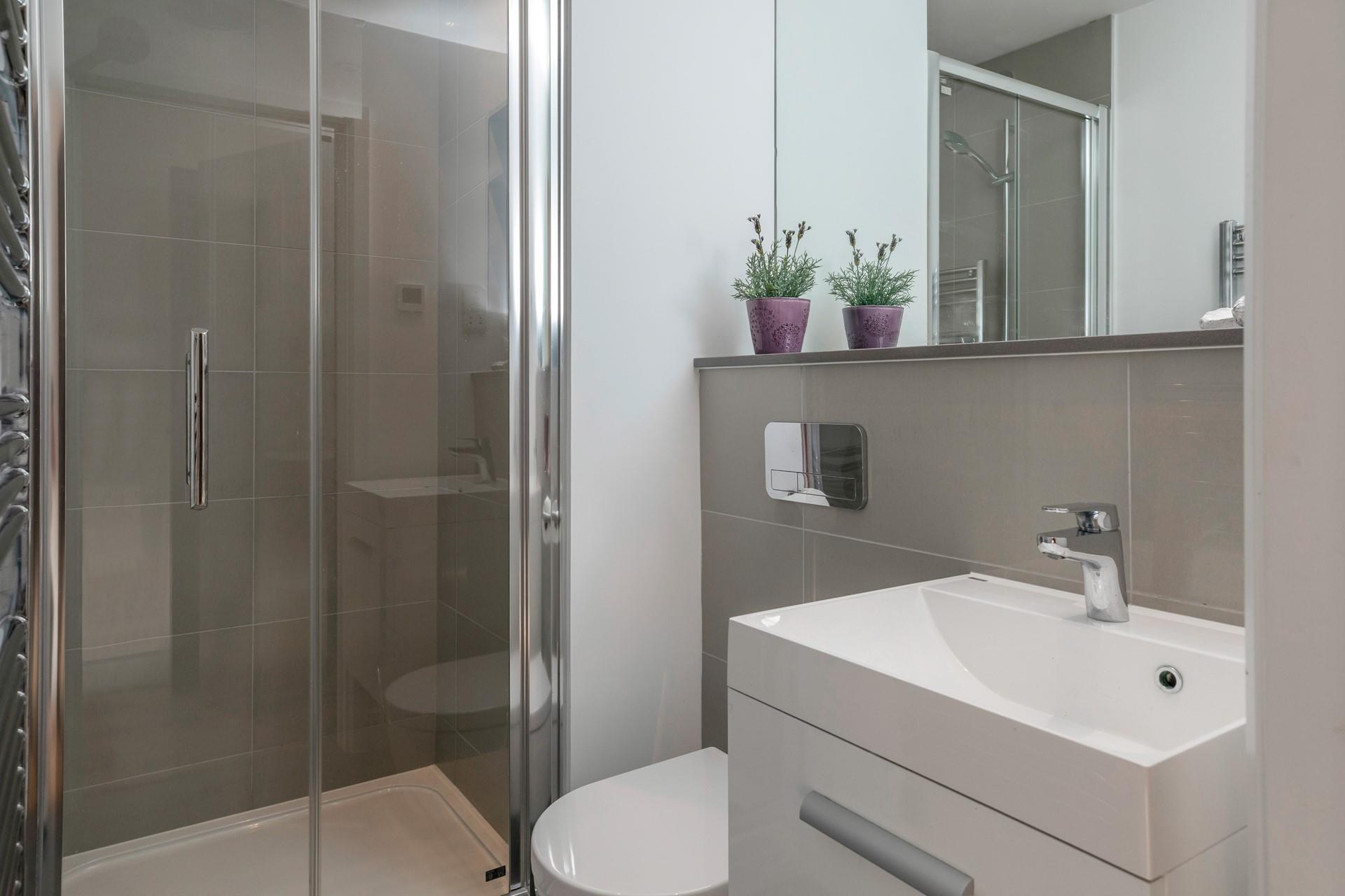 Wash off sandy toes in the shower room.