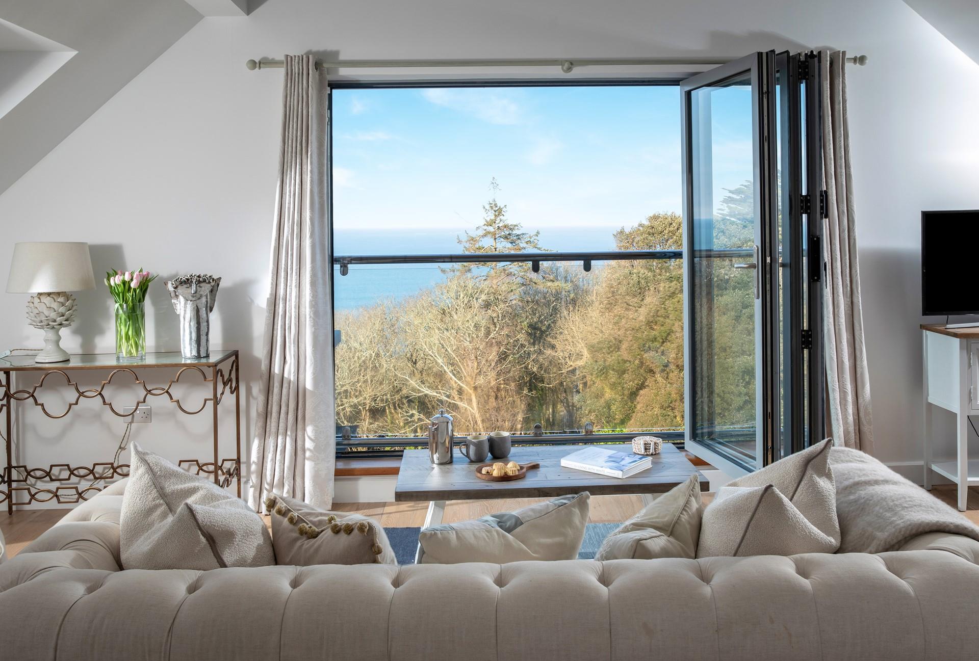 Open the bi-fold doors and let the summer breeze drift into the apartment.