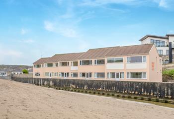 Sand Bay apartments are ideally located right on the beach.