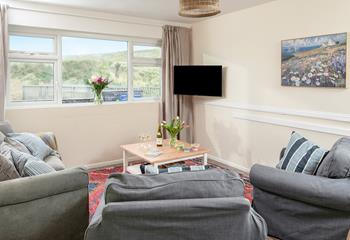 Relax and unwind in the cosy living space.