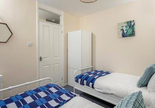 Blue tones reflect the seaside location.