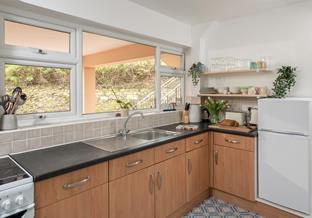 The kitchen is fully equipped for preparing and cooking wholesome meals.