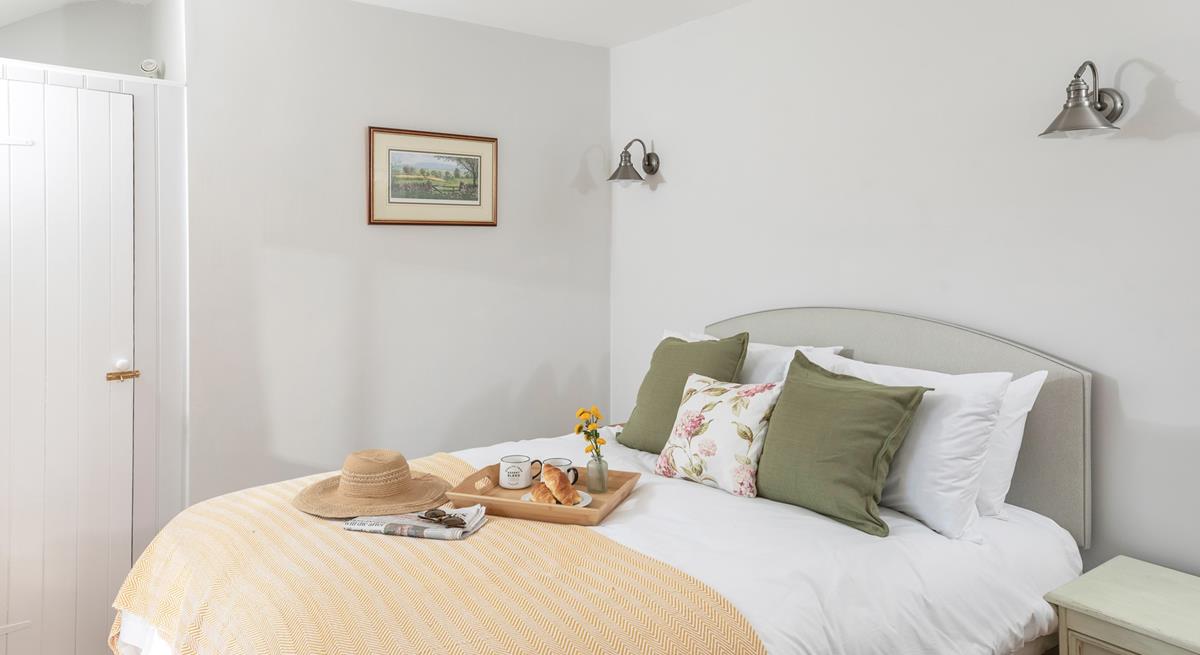 The bedrooms are decorated with tasteful soft furnishings.